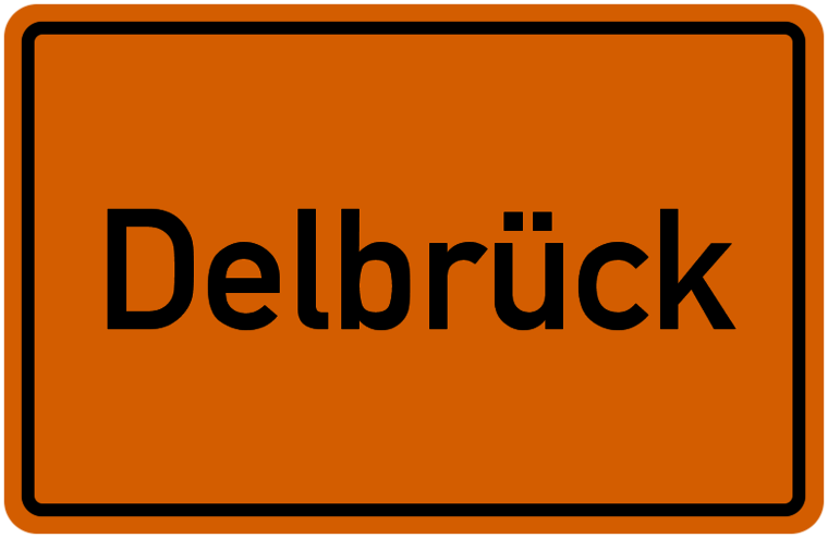 Ortseingangsschild Delbrück - schwarze Schrift auf orangenem Grund